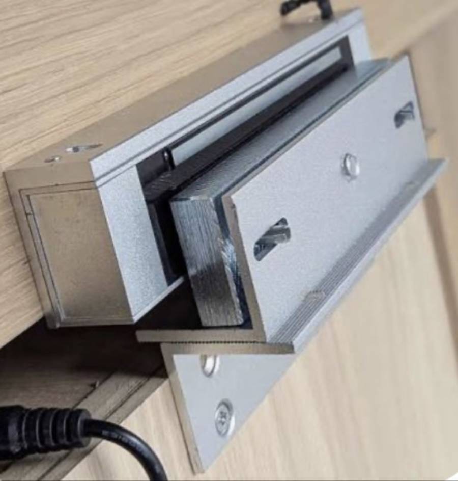 Close-up of installed electromagnetic lock